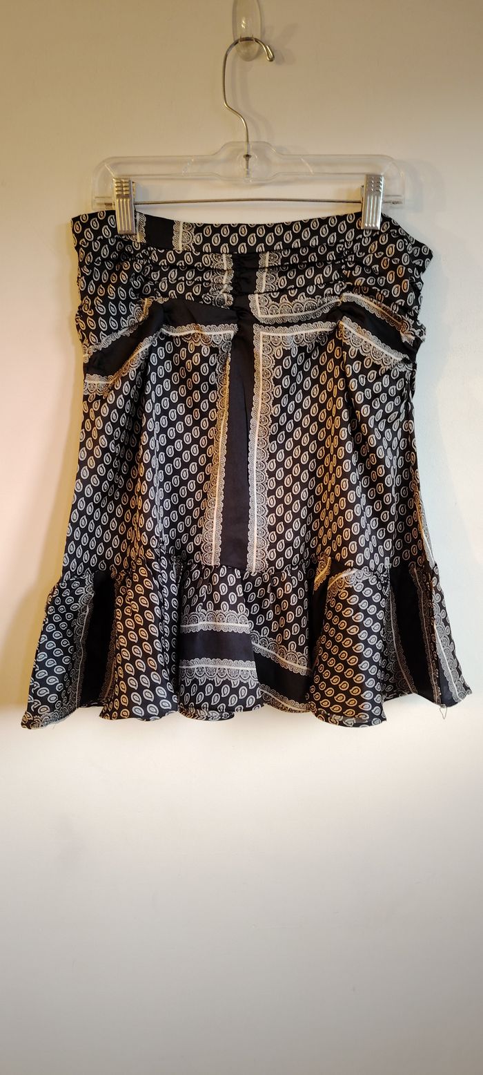 Jupe Manolie noire à motifs cachemire – taille S – effet volanté