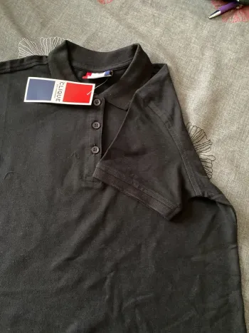 Polo femme noir S manches courtes