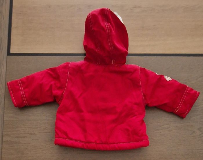 Blouson bébé rouge en parfait état 6 mois comme neuf