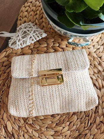 Sac/ pochette en paille tresée beige