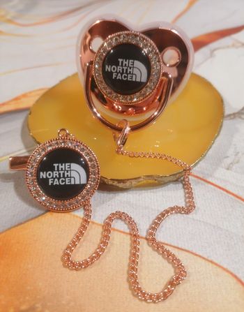 Tétine The North face rose gold