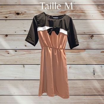 Robe avec noeud papillon