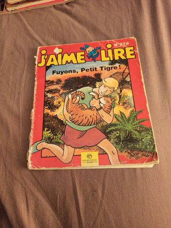 J'aime lire fuyons petit tigre