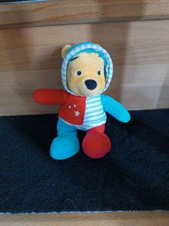 Doudou bleu Winnie l'ourson