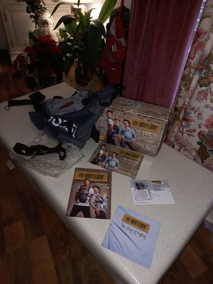 Porte bébé neuf dans son emballage d'origine Bykay