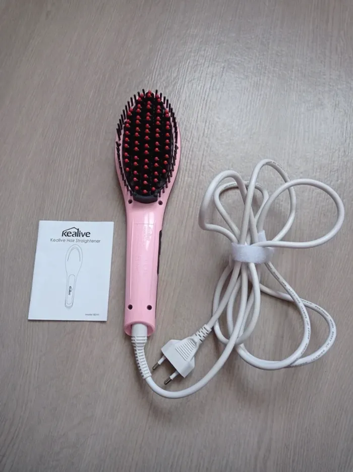 Brosse chauffante a lisser rose