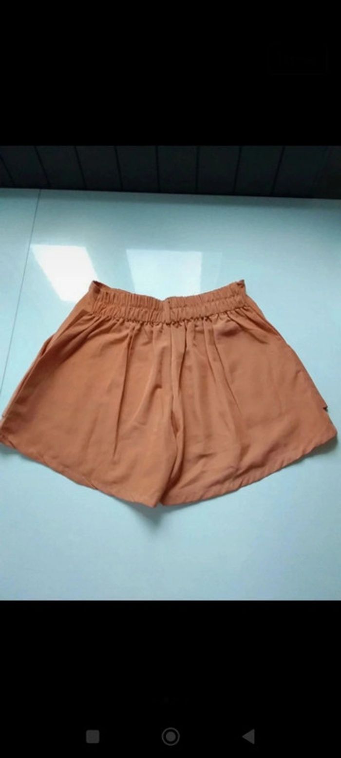 Short orange neuf