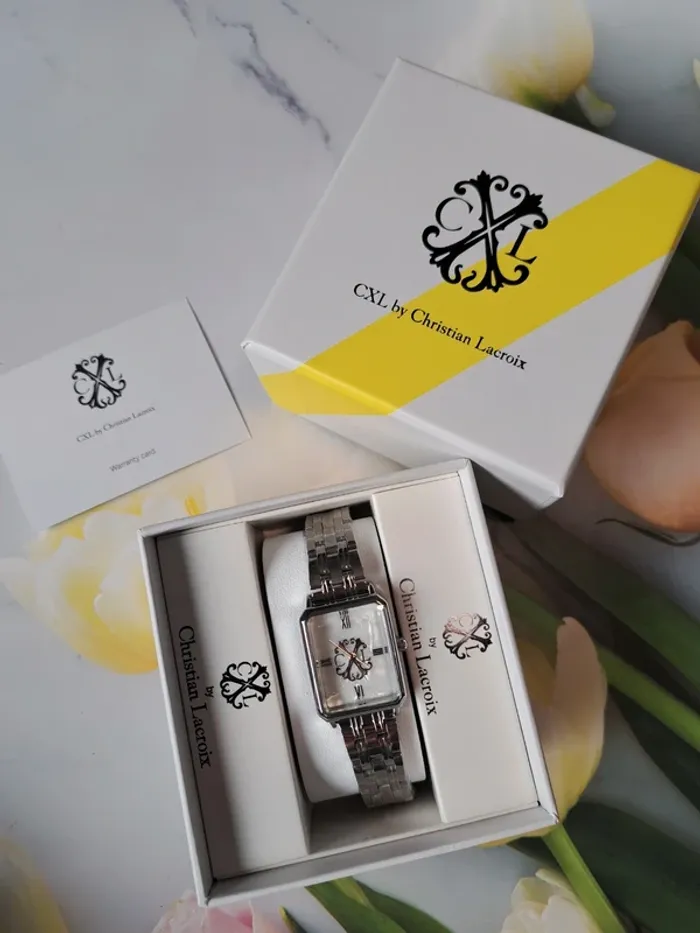 Christian Lacroix montre a quartz argenté et blanc - photo numéro 6