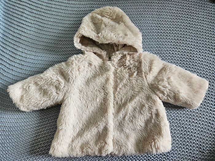 Manteau fourrure crème