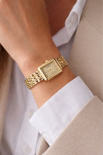 Montre dorée vintage cadran carré chiffres romains