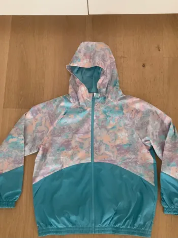 Under Armour Coupe-vent à capuche Woven Printed FD - bleu clair et rose : taille 14-16 ans
