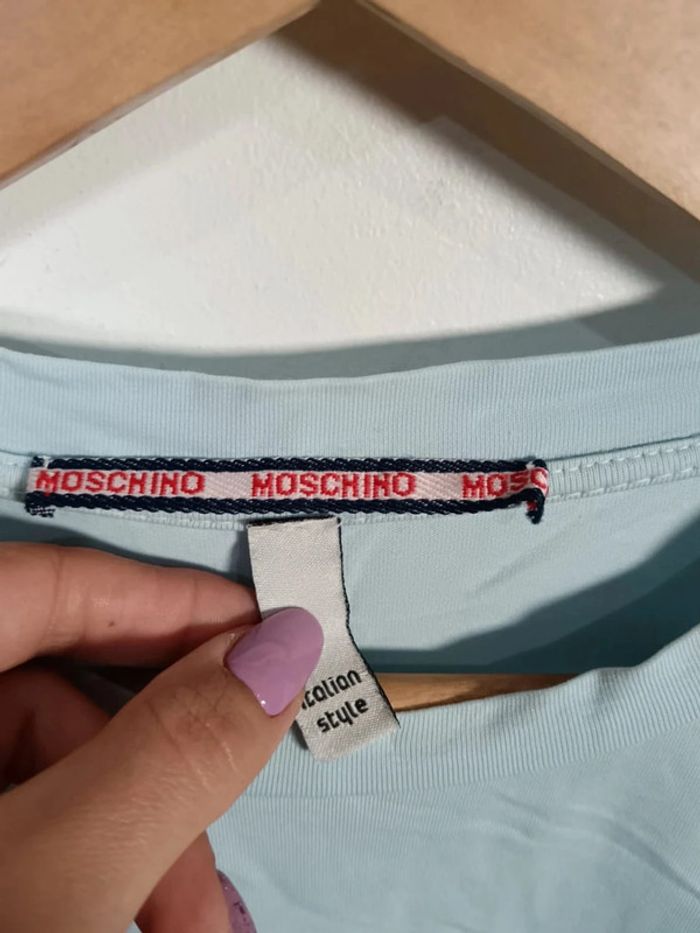 C21 t-shirt turquoise Moshino T1/T2 - photo numéro 3
