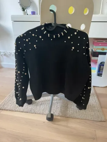Pull avec perles