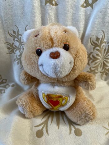 Petite peluche Bisounous Care Bears Gros champion vintage