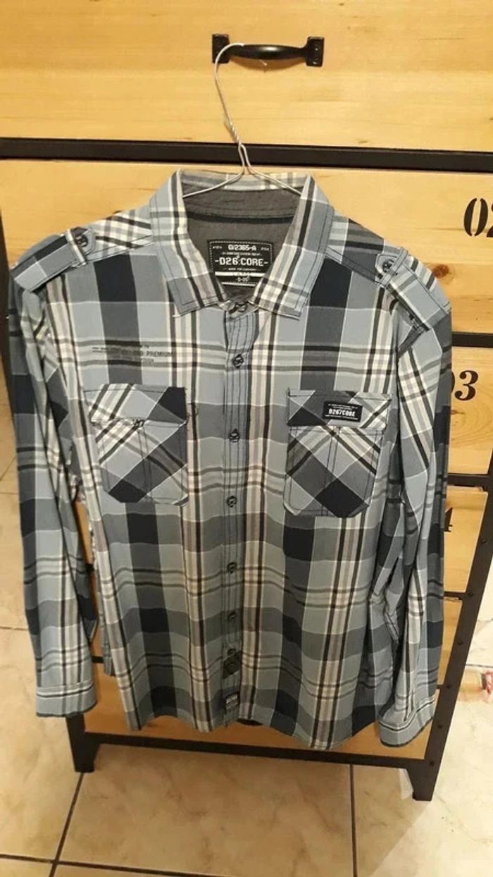 Chemise à carreaux très bon état taille L/42