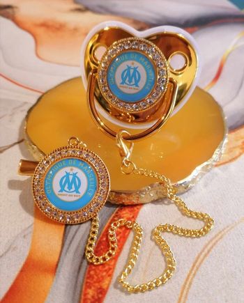 Tétine doré olympique de Marseille
