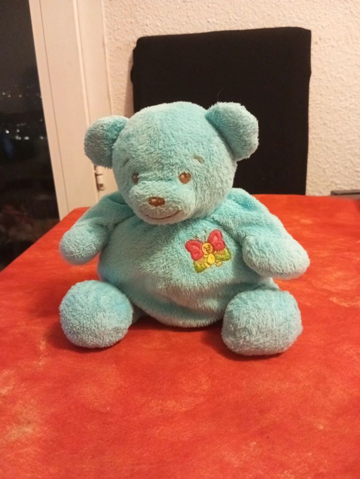 Ours ourson papillon bleu marque Nounours