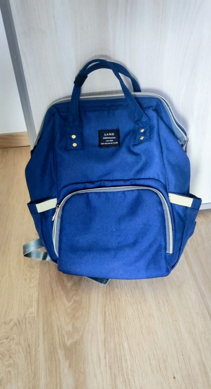 Sac à langer bleu type sac à dos