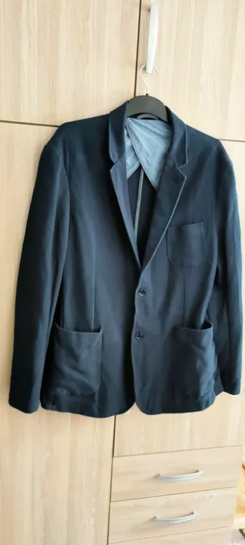 Veste bleu marine Celio club, en très bon état