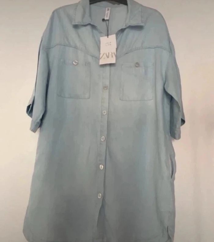 Chemise longue Zara taille XS coupe large neuve  Poches sur le côté