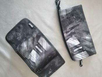 Lot trousse et portefeuille