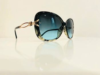 Lunette de soleil femme noire et verte léopard verres dégradés uvprotection catégorie 2
