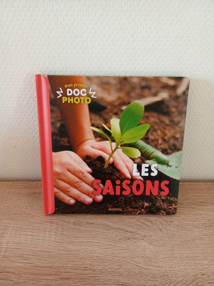 Livre neuf pour bébé. Doc photos. Les saisons
