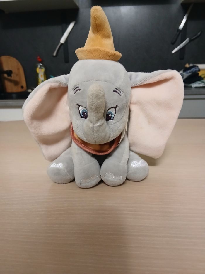 Peluche disney 12cm matiere polyster  couleur gris,rose,moutarde - photo numéro 3