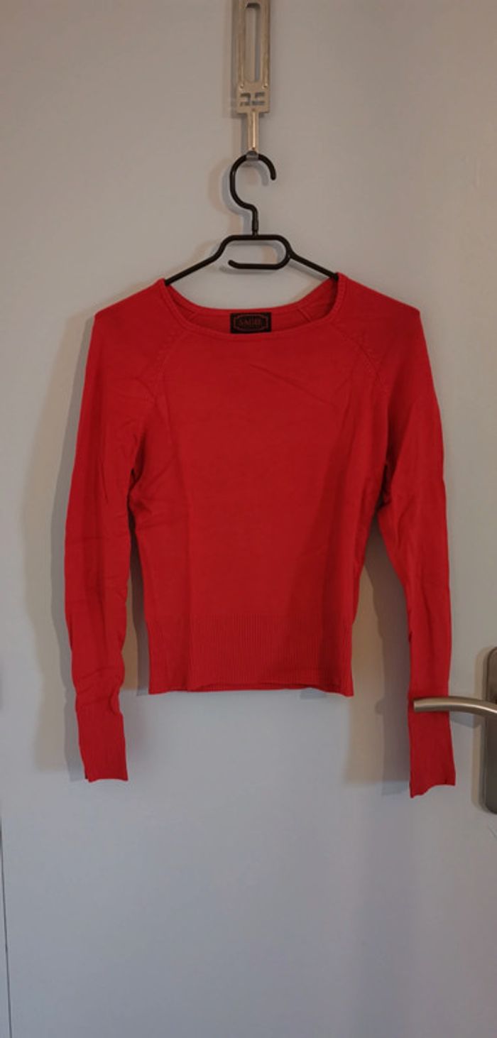 Pull rouge T.S