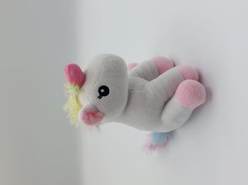 Petite peluche doudou licorne blanc rose crinière queue multicolore env. 15 cm