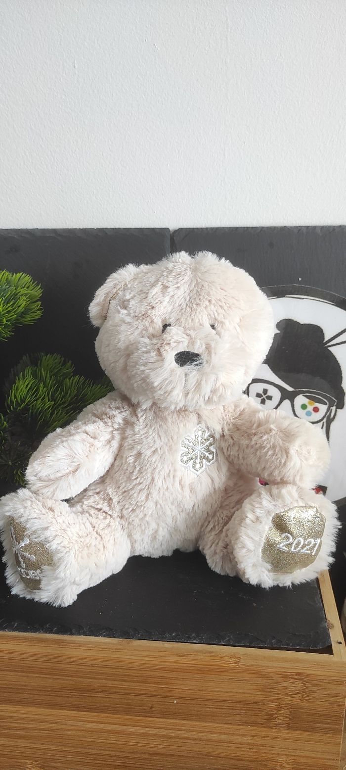 doudou peluche ours Nocibé blanc beige dore paillette flocon de neige 2021
