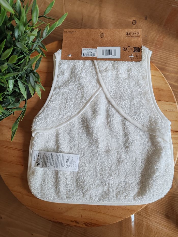 Bavoir tablier fleuri blanc bi matière  Kiabi Neuf 6 à 12 mois 🌸 - photo numéro 2