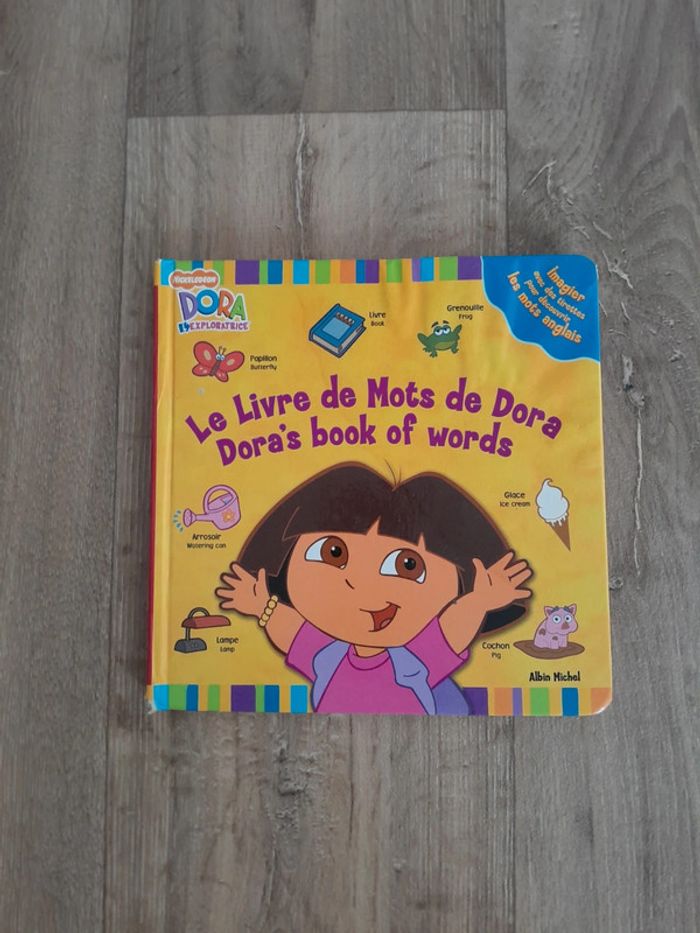 Livre Dora l'exploratrice imagier avec des tirettes mot anglais 🌺 - photo numéro 2