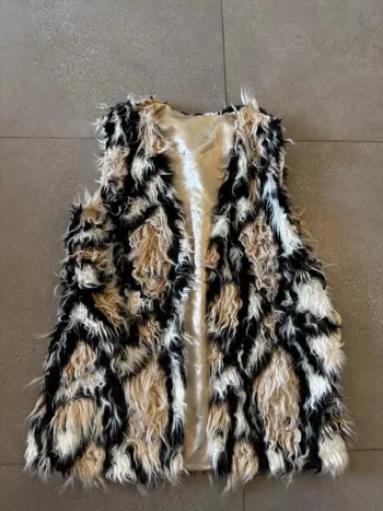 Veste sans manches, taille S/M, très bon état