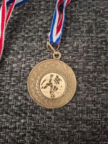 Médaille de football neuve