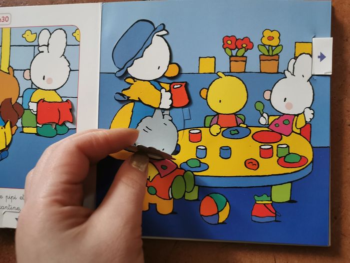 Un livre animé. Petit Lapin Blanc. Mon premier jour d'école. - photo numéro 3