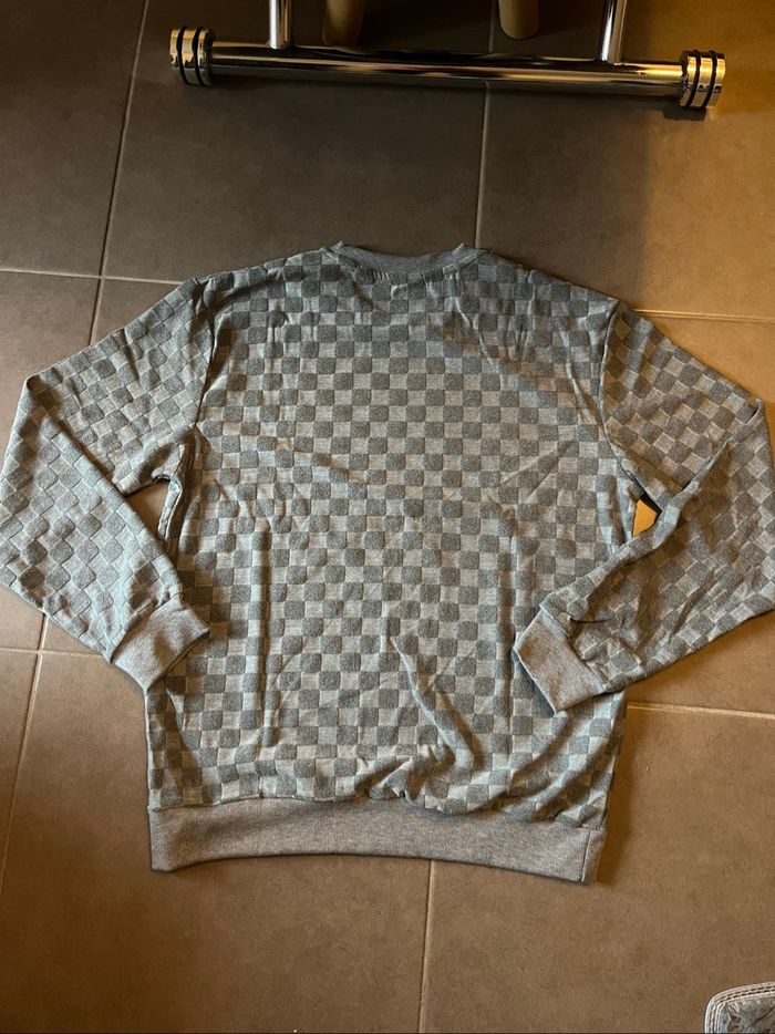 Pull à damier gris taille M neuf