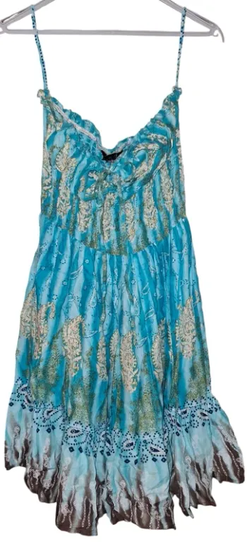 Robe à bretelle taille 40 en très bon état "double decker"