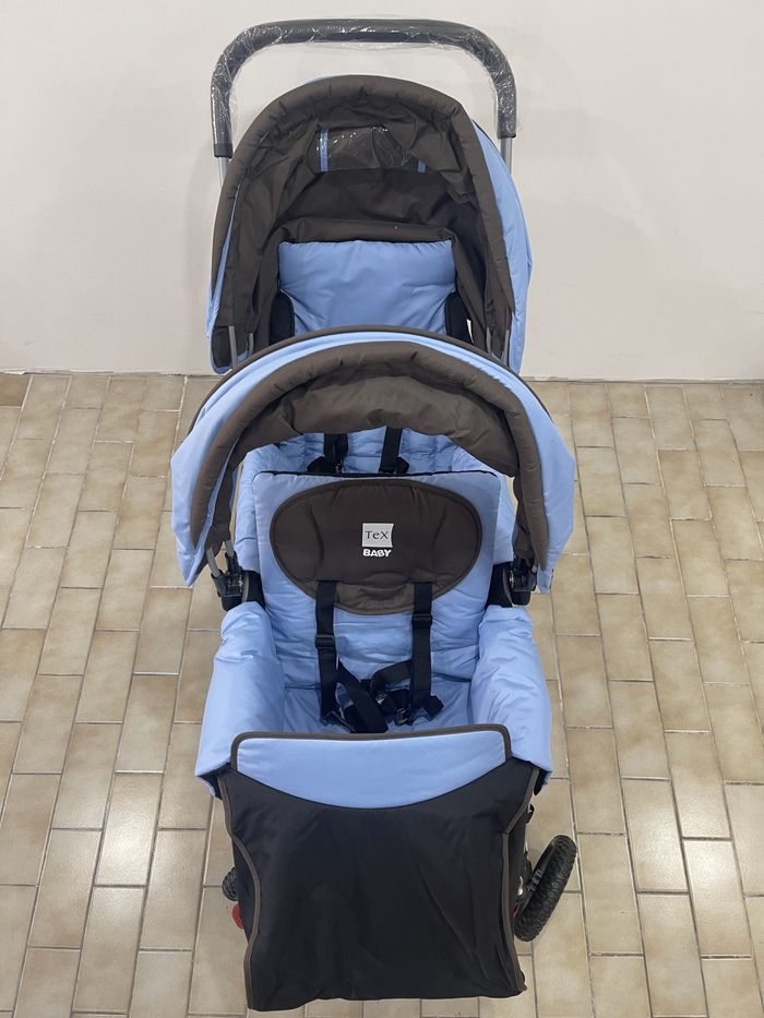 Poussette double NEUVE + housse pluie. Jamais utilisée - photo numéro 4