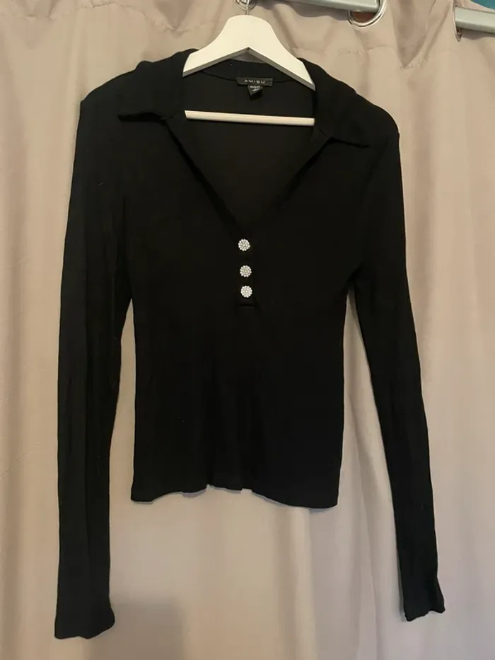Pull noir moulant