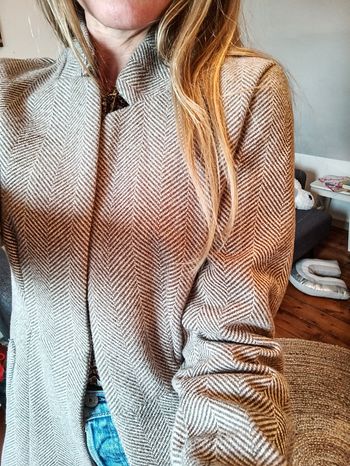 Veste Attention défaut au dos