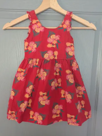 Robe rétro rouge a fleurs mini stéréo 6 mois vintage