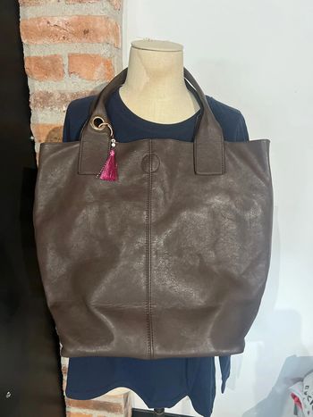 Sac avec pochette intérieur plus porte monnaie .