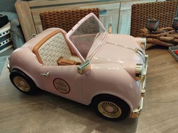 Voiture poupée our generation