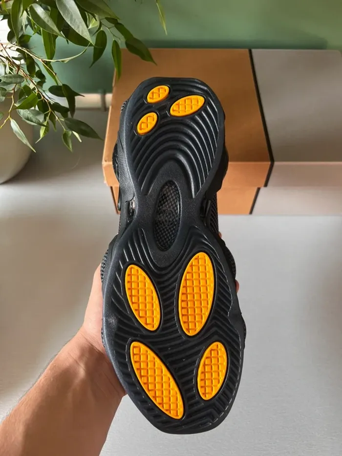 Nike × NOCTA Glide “Black / Iron Grey / University Gold” - photo numéro 10