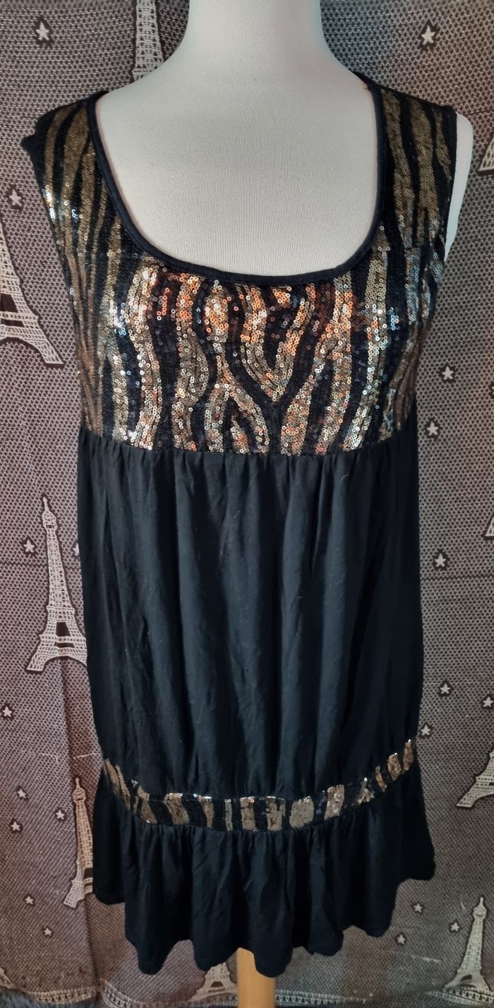 Tunique noir à strass doré taille 4