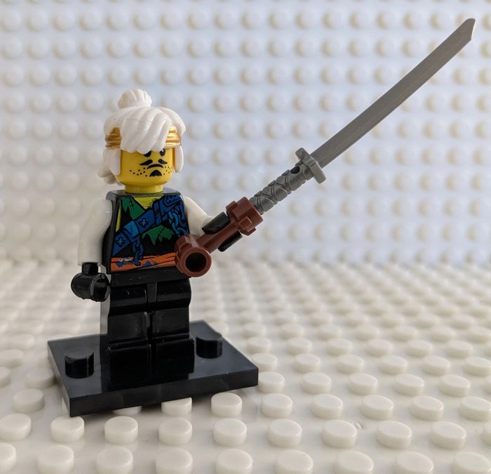 Figurine Ninjago : Wu Teen (Sensei Wu) en tenue de chasseur de dragons , style lego