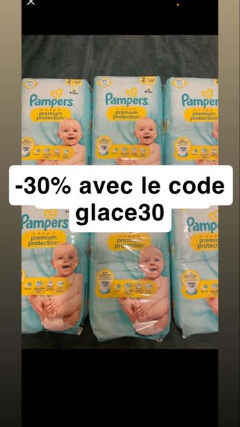 Six paquets de couches Pampers taille 2