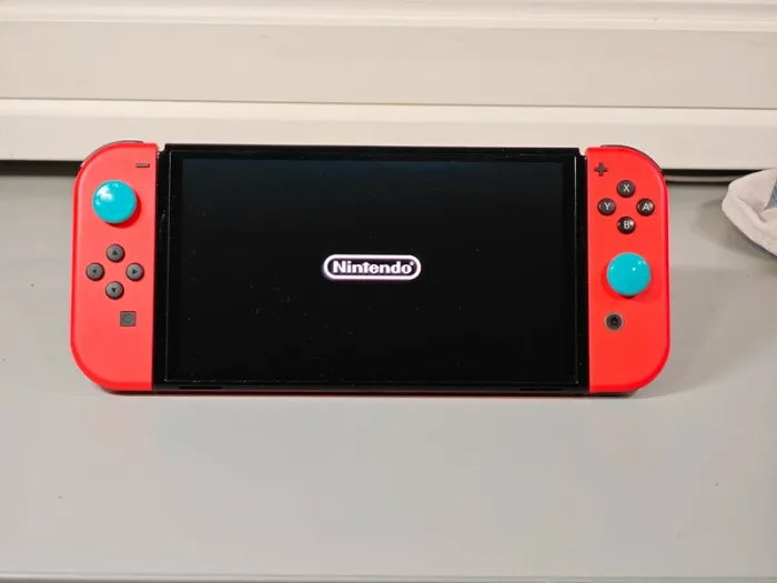 Console Nintendo Switch Oled collector édition rouge Mario / Garanti 1 an - photo numéro 3