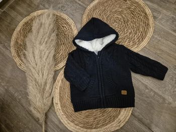 Gilet en laine torsadé avec moumoute